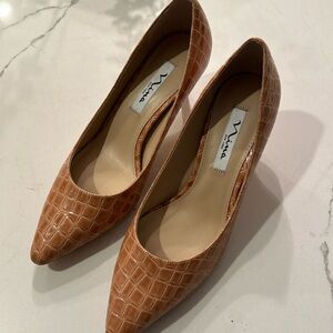 New heels; latte colored Nina brand pumps.  Stylish with croco pattern.  Size 9